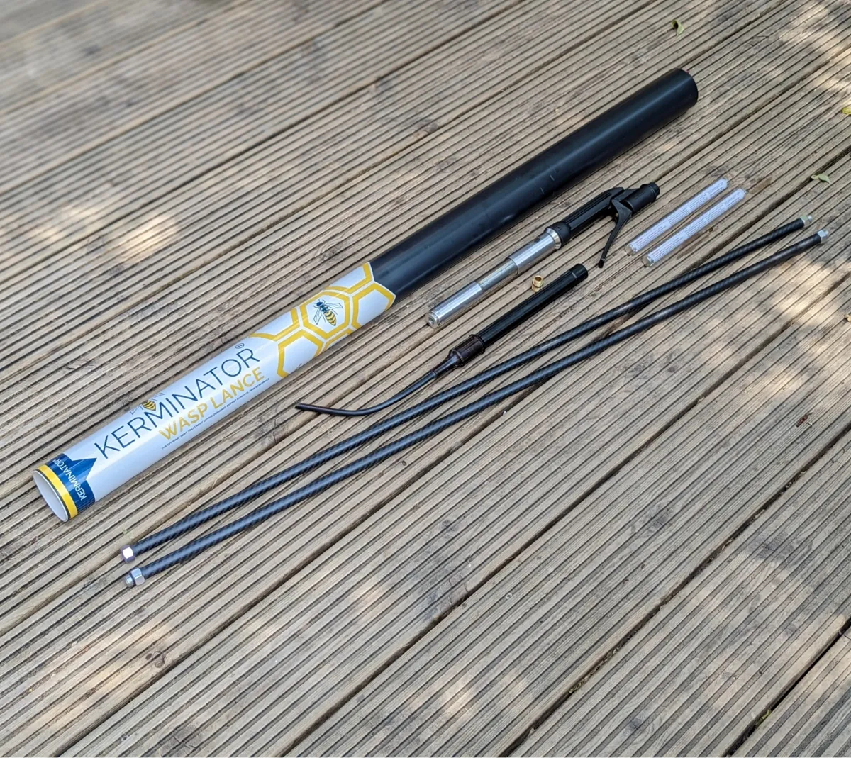 Kerminator Wasp Lance components on a wooden surface