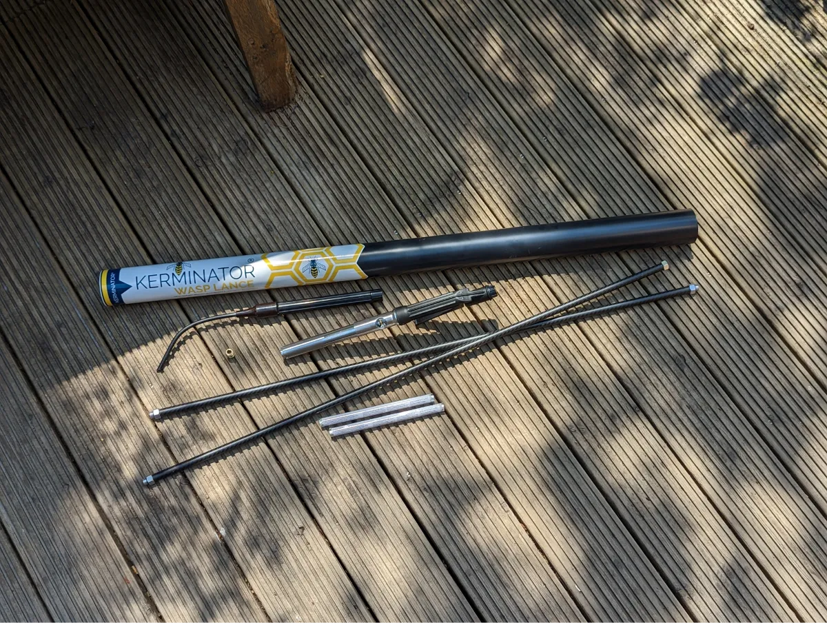 Kerminator product with multiple components on a wooden surface
