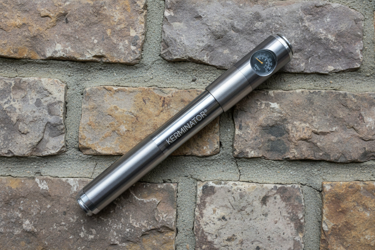 Kerminator pump photographed from above lying on a stone wall